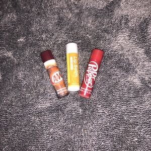 Bundle of three chapsticks: Dr. Pepper, Lemon, and A and W Root Beer